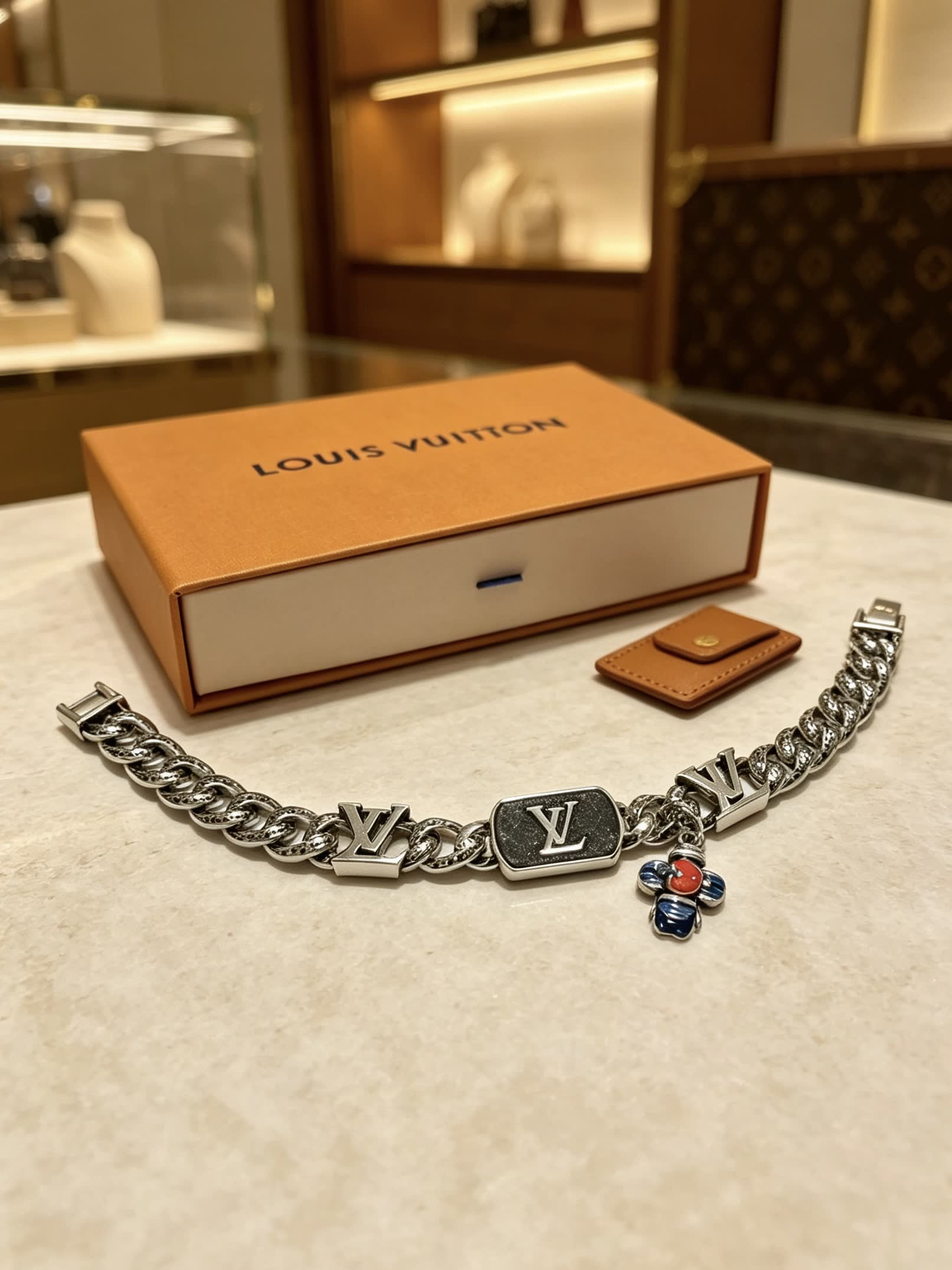 Louis Vuitton Silver Bracelet with Monogram Charms